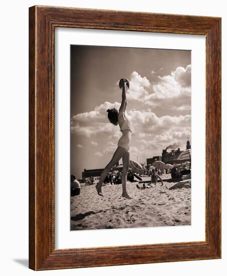 Young Woman Playing Ball on Beach-Philip Gendreau-Framed Photographic Print