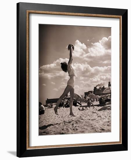 Young Woman Playing Ball on Beach-Philip Gendreau-Framed Photographic Print