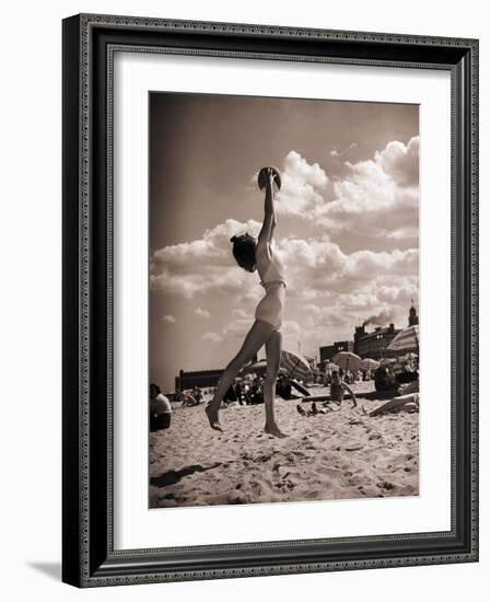 Young Woman Playing Ball on Beach-Philip Gendreau-Framed Photographic Print