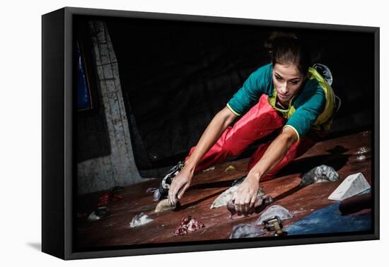 Young Woman Practicing Rock-Climbing on a Rock Wall Indoors-NejroN Photo-Framed Premier Image Canvas