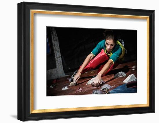 Young Woman Practicing Rock-Climbing on a Rock Wall Indoors-NejroN Photo-Framed Photographic Print