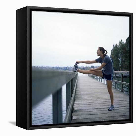 Young Woman Prepares for Jogging-Aaron McCoy-Framed Premier Image Canvas