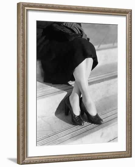 Young Woman's Legs in High Heels Sitting on a Step-null-Framed Photo