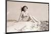 Young Woman Seated on Sand Dune-Bettmann-Mounted Photographic Print