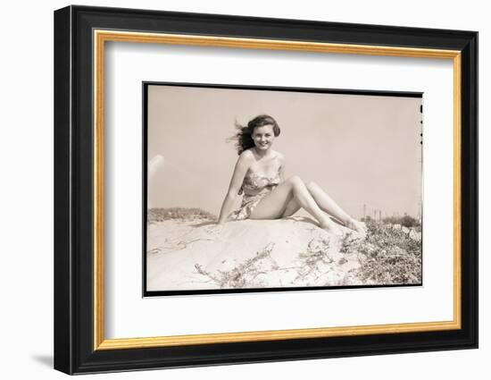 Young Woman Seated on Sand Dune-Bettmann-Framed Photographic Print