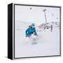 Young Woman Snowboarder in Motion on Snowboard in Mountains-Maxim Blinkov-Framed Stretched Canvas