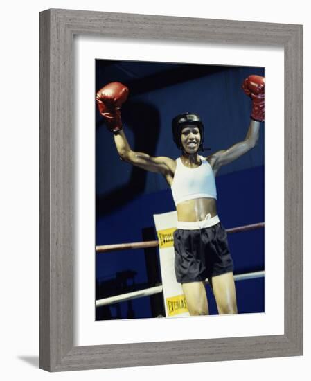 Young Woman Standing in a Boxing Ring-null-Framed Photographic Print