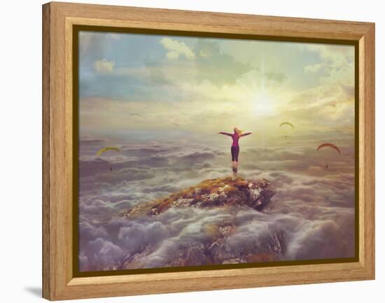 Young woman   standing on a rock with divorced hands-Natalia Moroz-Framed Stretched Canvas