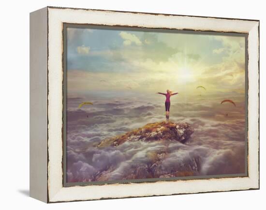 Young woman   standing on a rock with divorced hands-Natalia Moroz-Framed Stretched Canvas