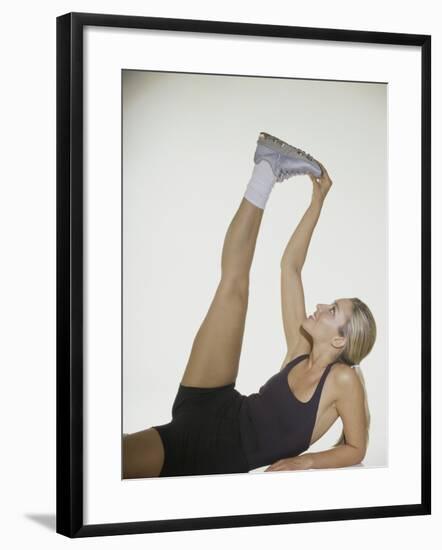 Young Woman Stretching-null-Framed Photographic Print