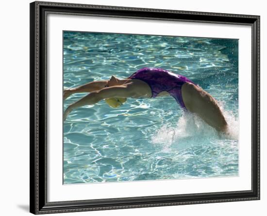 Young Woman Swimming the Backstroke in a Swimming Pool, Bainbridge Island, Washington, USA-null-Framed Photographic Print