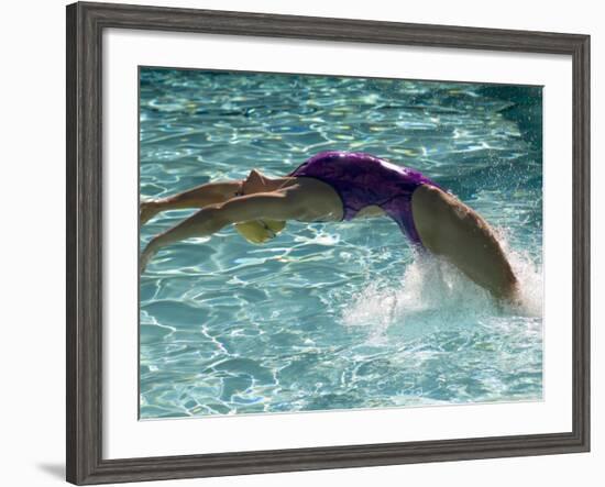 Young Woman Swimming the Backstroke in a Swimming Pool, Bainbridge Island, Washington, USA-null-Framed Photographic Print