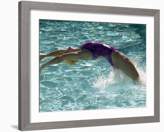 Young Woman Swimming the Backstroke in a Swimming Pool, Bainbridge Island, Washington, USA-null-Framed Photographic Print