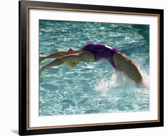 Young Woman Swimming the Backstroke in a Swimming Pool, Bainbridge Island, Washington, USA-null-Framed Photographic Print