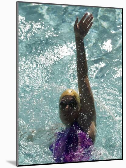 Young Woman Swimming the Backstroke in a Swimming Pool, Bainbridge Island, Washington, USA-null-Mounted Photographic Print