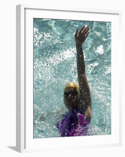 Young Woman Swimming the Backstroke in a Swimming Pool, Bainbridge Island, Washington, USA-null-Framed Photographic Print