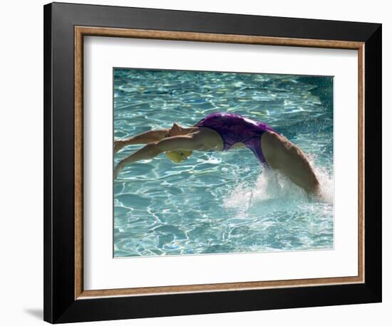 Young Woman Swimming the Backstroke in a Swimming Pool, Bainbridge Island, Washington, USA-null-Framed Photographic Print