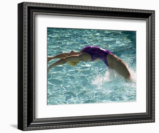 Young Woman Swimming the Backstroke in a Swimming Pool, Bainbridge Island, Washington, USA-null-Framed Photographic Print