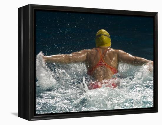 Young Woman Swimming the Butterfly Stroke in a Swimming Pool, Bainbridge Island, Washington, USA-null-Framed Premier Image Canvas