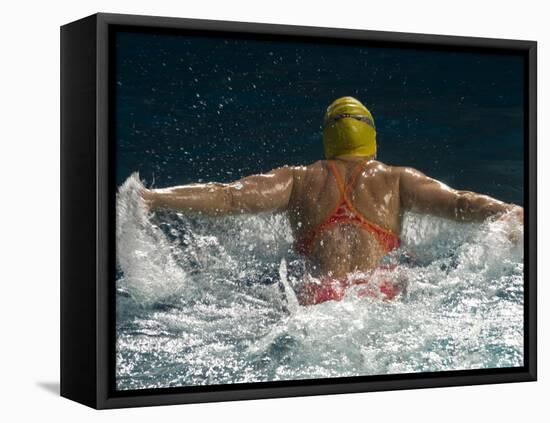 Young Woman Swimming the Butterfly Stroke in a Swimming Pool, Bainbridge Island, Washington, USA-null-Framed Premier Image Canvas