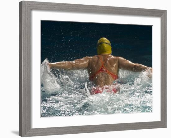 Young Woman Swimming the Butterfly Stroke in a Swimming Pool, Bainbridge Island, Washington, USA-null-Framed Photographic Print