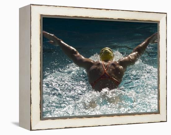 Young Woman Swimming the Butterfly Stroke in a Swimming Pool, Bainbridge Island, Washington, USA-null-Framed Premier Image Canvas