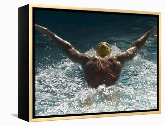 Young Woman Swimming the Butterfly Stroke in a Swimming Pool, Bainbridge Island, Washington, USA-null-Framed Premier Image Canvas