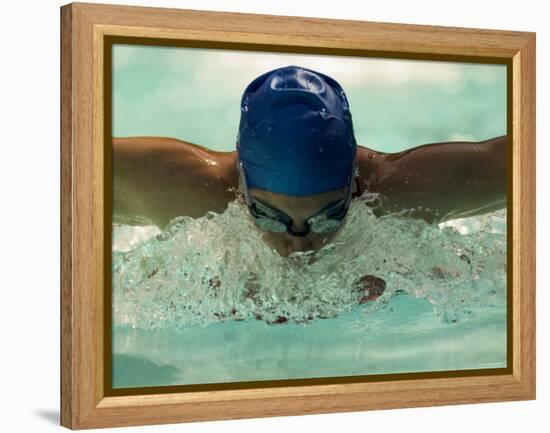 Young Woman Swimming the Butterfly Stroke in a Swimming Pool, Bainbridge Island, Washington, USA-null-Framed Premier Image Canvas