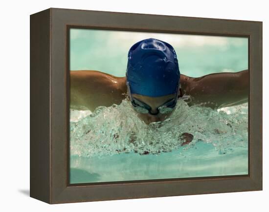 Young Woman Swimming the Butterfly Stroke in a Swimming Pool, Bainbridge Island, Washington, USA-null-Framed Premier Image Canvas