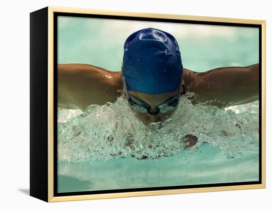 Young Woman Swimming the Butterfly Stroke in a Swimming Pool, Bainbridge Island, Washington, USA-null-Framed Premier Image Canvas