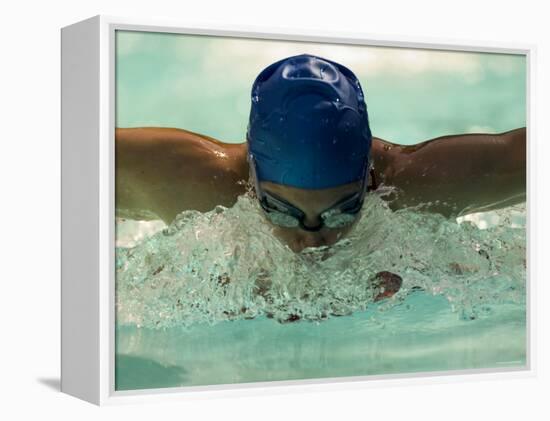 Young Woman Swimming the Butterfly Stroke in a Swimming Pool, Bainbridge Island, Washington, USA-null-Framed Premier Image Canvas