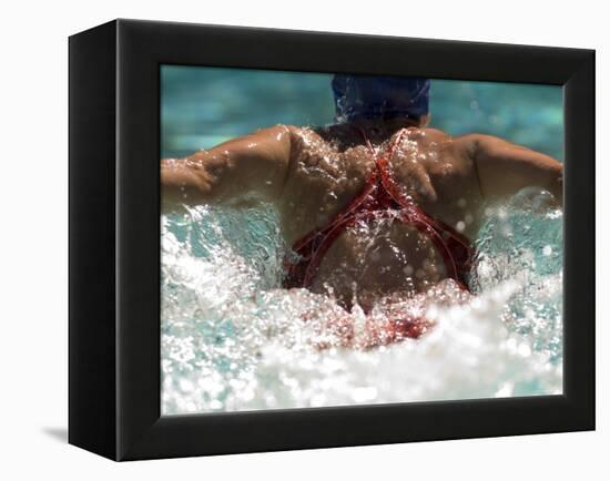 Young Woman Swimming the Butterfly Stroke in a Swimming Pool, Bainbridge Island, Washington, USA-null-Framed Premier Image Canvas