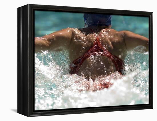 Young Woman Swimming the Butterfly Stroke in a Swimming Pool, Bainbridge Island, Washington, USA-null-Framed Premier Image Canvas