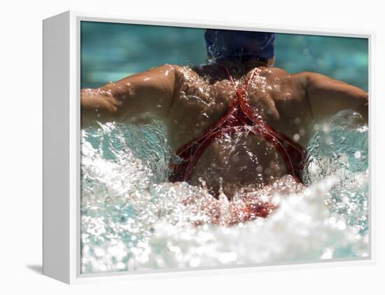 Young Woman Swimming the Butterfly Stroke in a Swimming Pool, Bainbridge Island, Washington, USA-null-Framed Premier Image Canvas