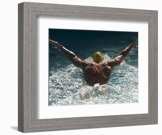 Young Woman Swimming the Butterfly Stroke in a Swimming Pool, Bainbridge Island, Washington, USA-null-Framed Photographic Print