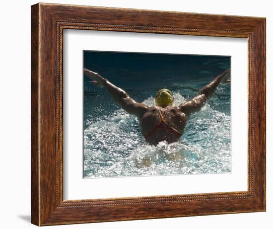 Young Woman Swimming the Butterfly Stroke in a Swimming Pool, Bainbridge Island, Washington, USA-null-Framed Photographic Print