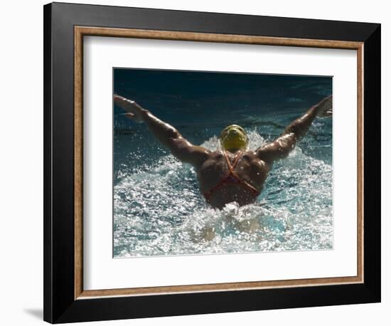 Young Woman Swimming the Butterfly Stroke in a Swimming Pool, Bainbridge Island, Washington, USA-null-Framed Photographic Print