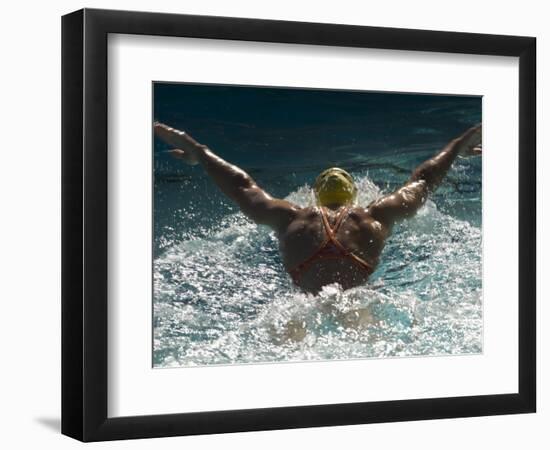 Young Woman Swimming the Butterfly Stroke in a Swimming Pool, Bainbridge Island, Washington, USA-null-Framed Photographic Print