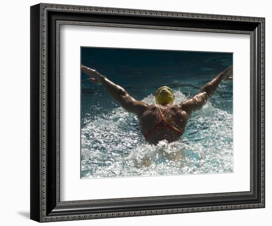 Young Woman Swimming the Butterfly Stroke in a Swimming Pool, Bainbridge Island, Washington, USA-null-Framed Photographic Print