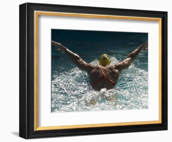 Young Woman Swimming the Butterfly Stroke in a Swimming Pool, Bainbridge Island, Washington, USA-null-Framed Photographic Print