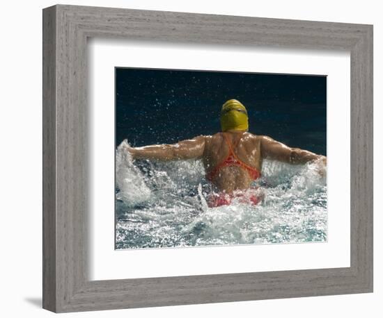 Young Woman Swimming the Butterfly Stroke in a Swimming Pool, Bainbridge Island, Washington, USA-null-Framed Photographic Print