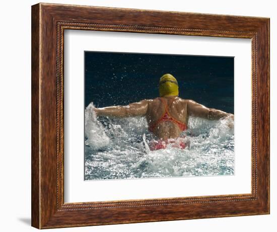 Young Woman Swimming the Butterfly Stroke in a Swimming Pool, Bainbridge Island, Washington, USA-null-Framed Photographic Print