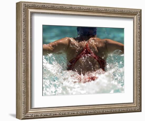 Young Woman Swimming the Butterfly Stroke in a Swimming Pool, Bainbridge Island, Washington, USA-null-Framed Photographic Print