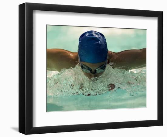 Young Woman Swimming the Butterfly Stroke in a Swimming Pool, Bainbridge Island, Washington, USA-null-Framed Photographic Print