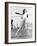 Young Woman Swinging a Baseball Bat in a Baseball Field-Everett Collection-Framed Photographic Print