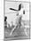 Young Woman Swinging a Baseball Bat in a Baseball Field-Everett Collection-Mounted Photographic Print