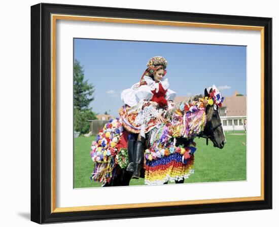 Young Woman Wearing Folk Dress on Horseback, Ride of the Kings Festival, Village of Vlcnov, Vlcnov-Richard Nebesky-Framed Photographic Print