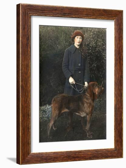 Young Woman with a Dog in a Garden-null-Framed Photographic Print