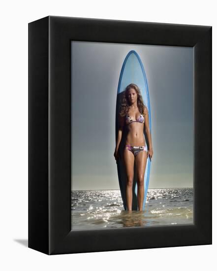 Young Woman with a Surfboard-Ben Welsh-Framed Premier Image Canvas