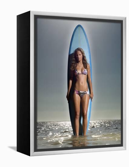 Young Woman with a Surfboard-Ben Welsh-Framed Premier Image Canvas